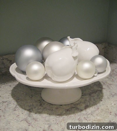 Cake stand with ornaments and ceramic pears