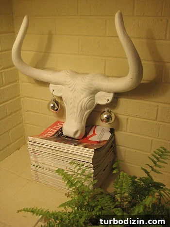 Metal bull with ornament earrings