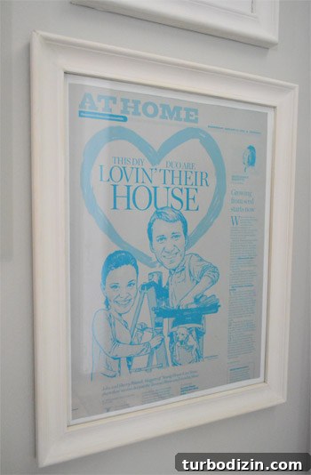 Framed newspaper plate on wall