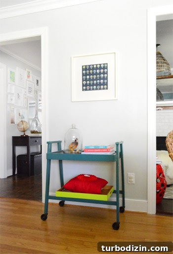 Teal bar cart in dining room