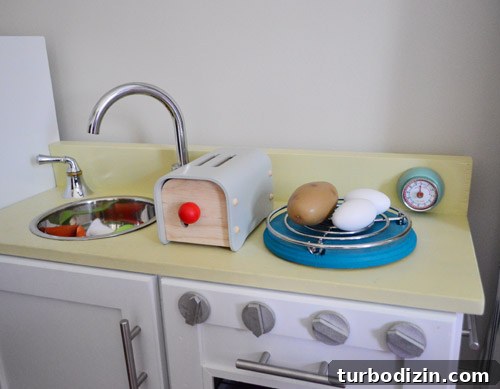 Timer attached to play kitchen