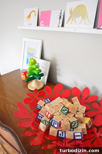 Playroom Finishing Touches: Stylish Ideas to Complete the Space 11 Red bowl with lettered blocks