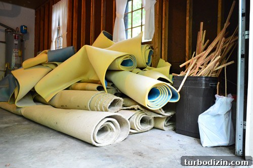 stacks for old carpet rolls ready for removal