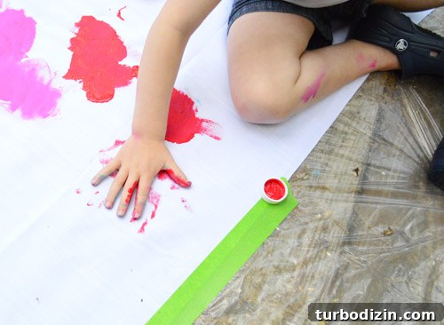 How to Create a Hand-Painted Fabric Backdrop at Home 9 Handprint on fabric