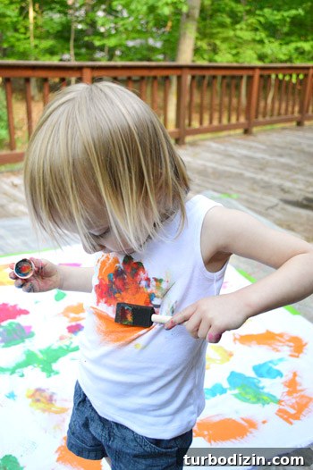 How to Create a Hand-Painted Fabric Backdrop at Home 10 Painted shirt