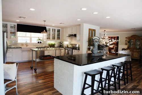 Chip and Joanna's Farmhouse Kitchen Renovation Guide 3 Bright farmhouse kitchen with white tile and dark counters