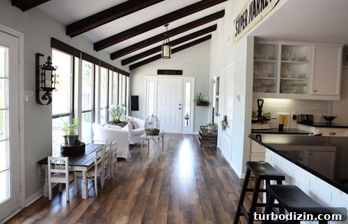 Chip and Joanna's Farmhouse Kitchen Renovation Guide 6 Cozy farmhouse kitchen with sloped beams