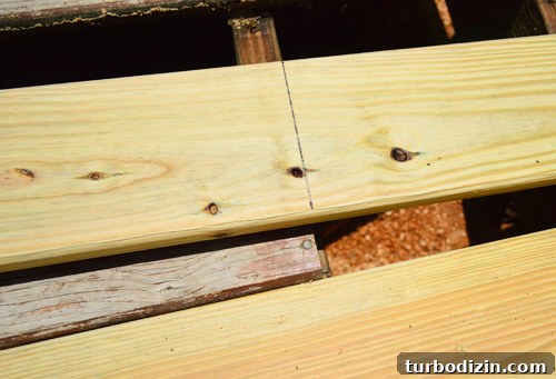 Fix a Hole in Your Deck: Step-by-Step Repair Guide 11 Marking line for cut of new deck board
