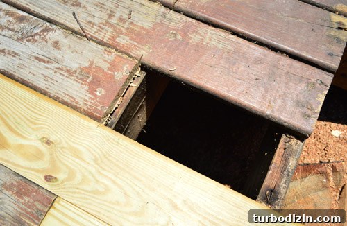 Fix a Hole in Your Deck: Step-by-Step Repair Guide 8 Cutting back existing deck boards to repair hole in wood deck