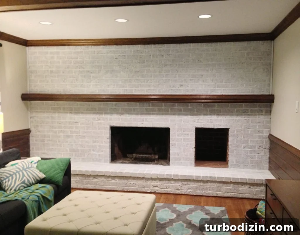 Whitewashing a Brick Fireplace: Step-by-Step Guide for a Fresh Look 11 darker whitewash technique on brick wall fireplace using two coats of watered down white paint