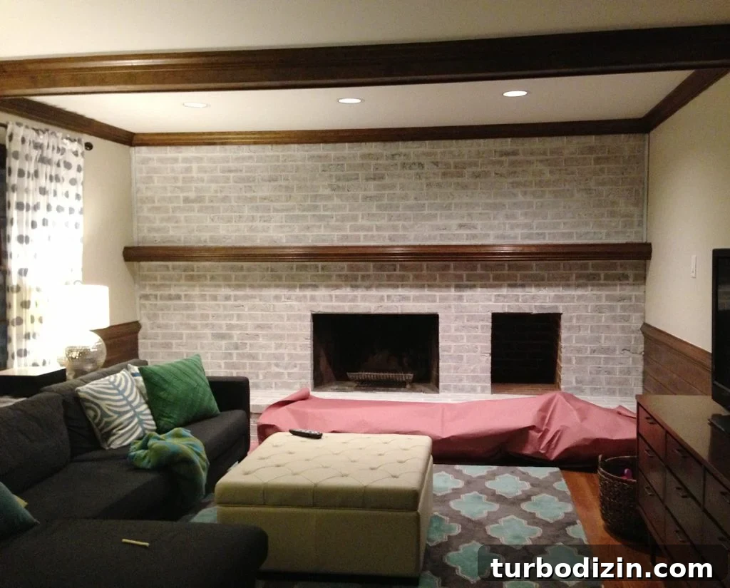 Whitewashing a Brick Fireplace: Step-by-Step Guide for a Fresh Look 10 lightly whitewashed brick wall in living room with fireplace and mantle using leftover white paint