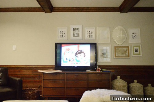 How to Arrange a Gallery Wall Around Your TV for Impact 6 Almost finished hanging frames