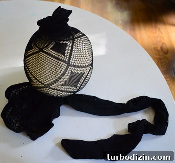 Putting a pumpkin into fishnet
