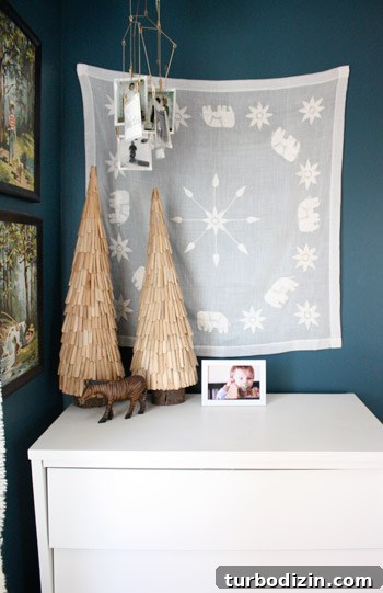 Blue Nursery for a Boy with Clouds and Stars Decor 5 Dresser and wall tapestry in boy's room
