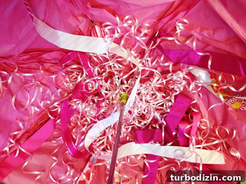 Pink curling ribbon tentacles