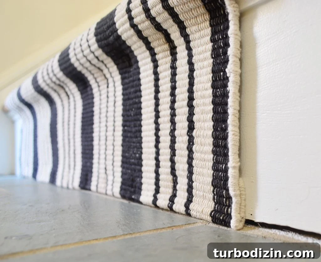 detail of how bottom of runner is folded to hide cut seam