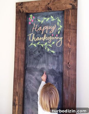 DIY Gratitude Jar: Simple Family Project to Share Thanks 7 Oversized DIY chalkboard with Happy Thanksgiving message drawn in chalk