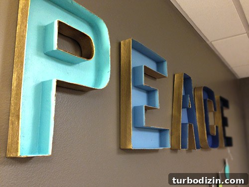 4 DIY Holiday Crafts to Transform Your Home This Season 17 Finished cardboard craft letters painted in gradient for holiday decorations in Childrens Hospital of Richmond