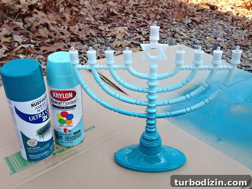 4 DIY Holiday Crafts to Transform Your Home This Season 19 Two cans of blue spray paint for DIY Menorah painting holiday project for gradient effect