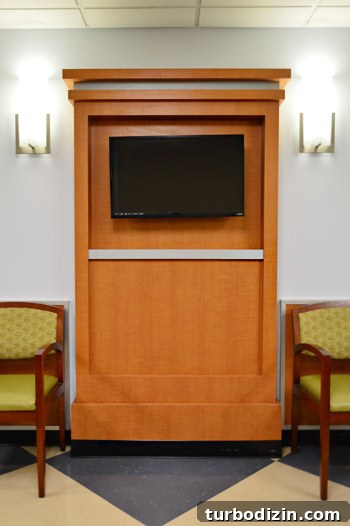 4 DIY Holiday Crafts to Transform Your Home This Season 3 Wood mantle with TV in Childrens Hospital waiting room