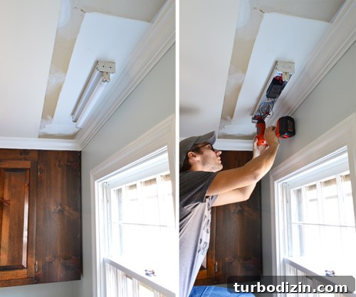 Fluorescent light fixture above kitchen sink getting uninstalled