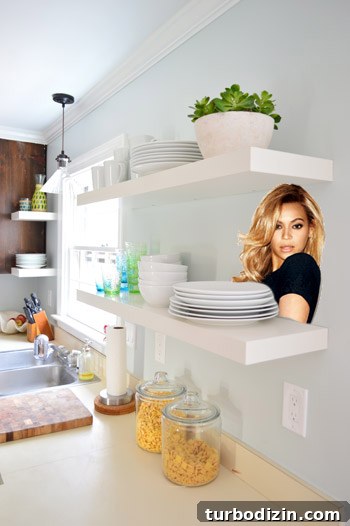 How We Installed Ikea Floating Shelves in Our Kitchen 3 white Ikea Lack floating shelves in our kitchen with Beyonce photoshopped on one of them