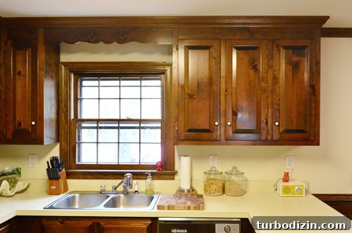 How We Installed Ikea Floating Shelves in Our Kitchen 4 before photo of dated 1980s kitchen with dark wood wall cabinets