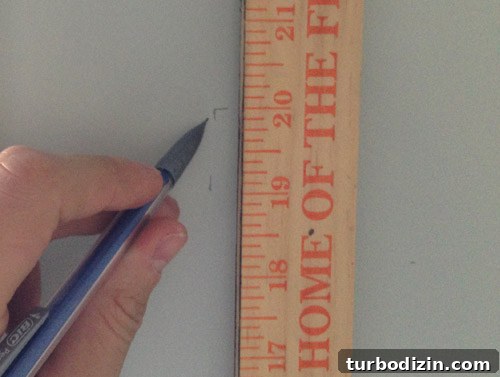 How We Installed Ikea Floating Shelves in Our Kitchen 7 using a yardstick and pencil to mark the height and placement of kitchen floating shelves