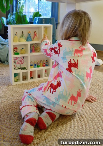 DIY Wood Cubby Shelf for a Kids Room: Step-by-Step Build Guide 17 Clara opening her cubby