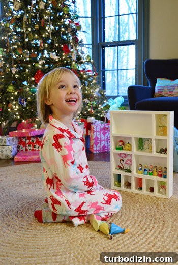 DIY Wood Cubby Shelf for a Kids Room: Step-by-Step Build Guide 3 Clara playing with figurines
