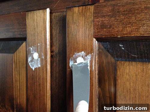 How to Make Wood Cabinets Darker: Step-by-Step Staining Guide 6 Wood filling old knobs holes in kitchen cabinets