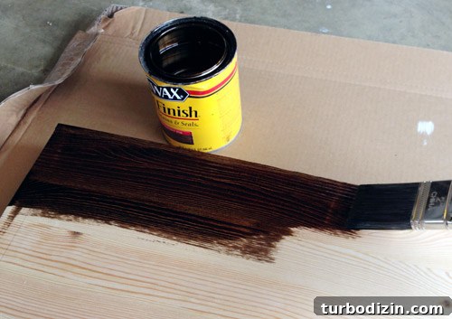 Applying A coat of Minwax Wood Stain Using a Brush