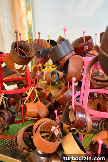 House Crashing: Joyful and Carefree Party Crashers 11 Leather Jewelry Cuffs On Display Racks