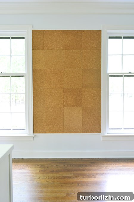 Create a Cork Wall Gallery for Kids’ Artwork 11 all cork tiles applied to giant cork board wall