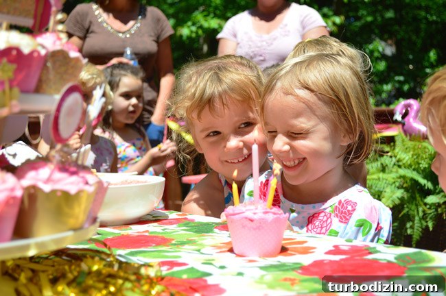 Pink and Gold Kids Party Ideas: Decorations, Cake & Outfit Tips 12 Clara enjoying party