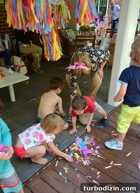 Pink and Gold Kids Party Ideas: Decorations, Cake & Outfit Tips 21 Kids grabbing treats