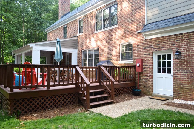 How to Paint a Garage Door and Outdoor Utility Box 8 View Of Brick House Backyard With Refreshed Garage Door Area