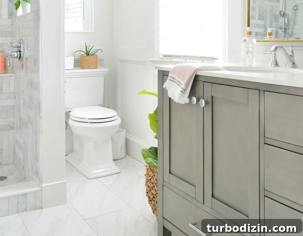 Kohler Memoirs Toilet In Marble Bathroom With Wall Molding