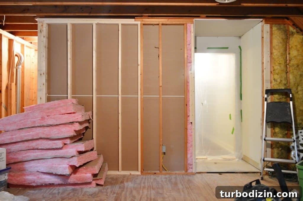 How to Hang Drywall Solo: A Step-by-Step Guide for DIYers 19 after photo of backside of laundry room with drywall completed on inside