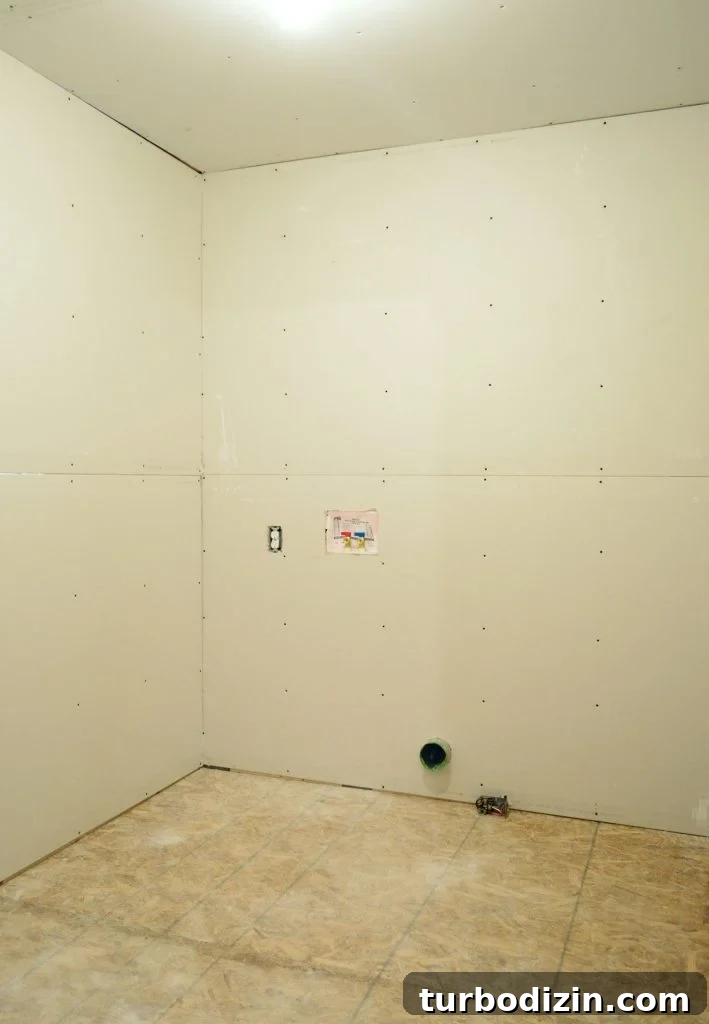 How to Hang Drywall Solo: A Step-by-Step Guide for DIYers 20 inside photo of laundry room after drywall installation was completed