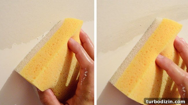Drywall Taping, Mudding, and Sanding: Step-by-Step Guide 30 using yellow songs to wipe rough ridge of dried drywall mud