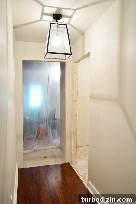 Hallway view into laundry room