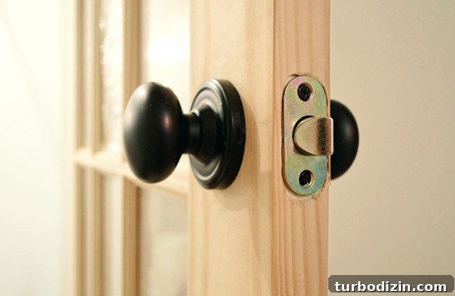 How to Hang a Door: Step-by-Step Guide for a Perfect Fit 33 Oil Rubbed Bronze Door Knob Set Into Newly Created Holes In Unfinished Door