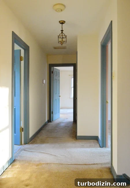 DIY Wainscoting Ideas to Transform Your Hallway 12 Hall-Before-Toward-Bedroom