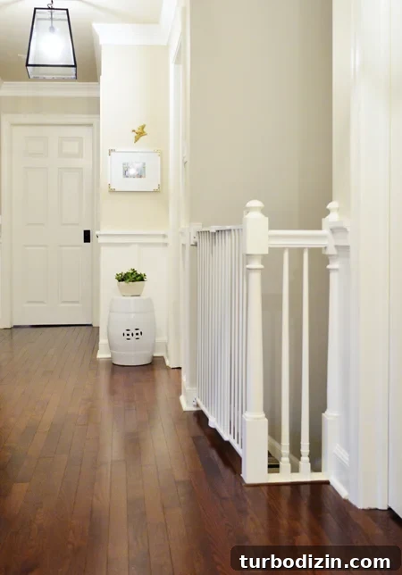 DIY Wainscoting Ideas to Transform Your Hallway 13 Hall-Baby-Gate-On-Stairs