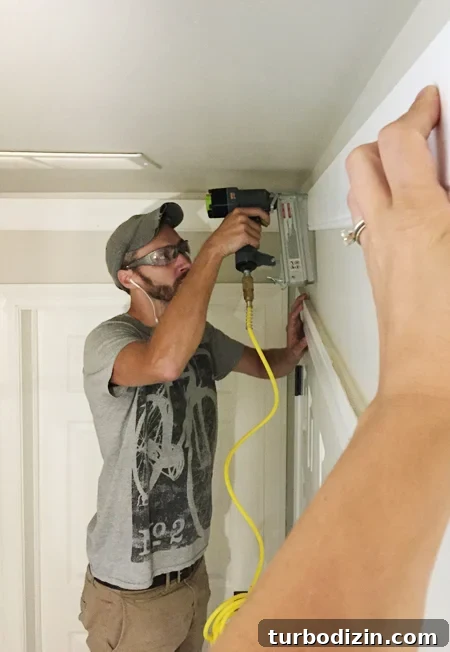 DIY Wainscoting Ideas to Transform Your Hallway 4 Hall-Adding-Crown