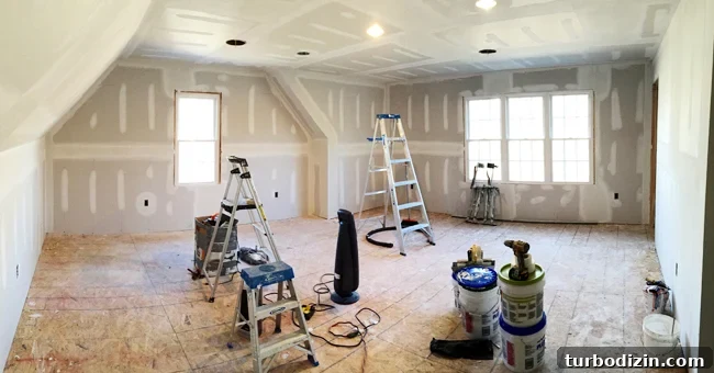 How We Finished the Bonus Room Over Our Garage: Step-by-Step Guide 8 Playroom-Before-Drywalled