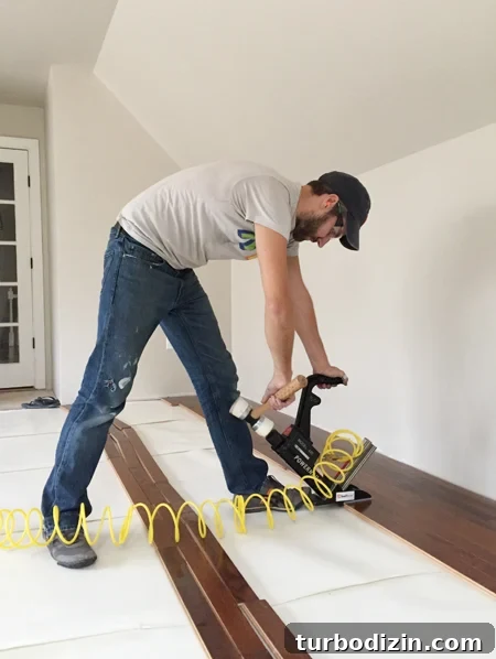 How We Finished the Bonus Room Over Our Garage: Step-by-Step Guide 9 Playroom-John-Nailing