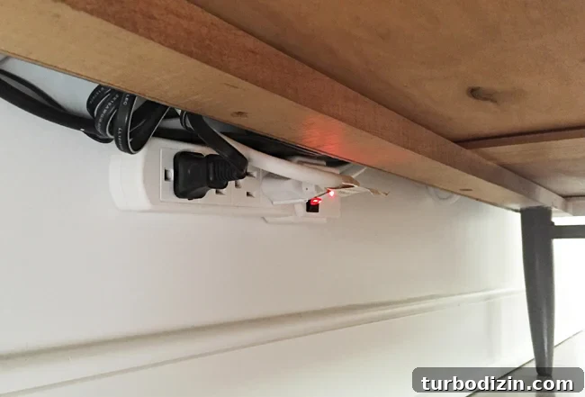 Hide TV Wires in the Wall: Step-by-Step Guide for Clean Installation 9 How-To-Hide-TV-Wires-Powerstrip-Off-Floor