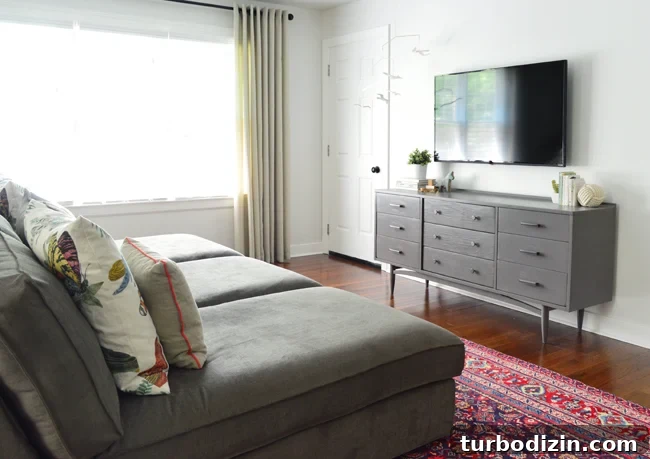 How We Transformed Our Bonus Room Into a Stylish Lounge 10 Playful-Family-Bonus-Room-Kivik-Chaise-Mega-Sofa